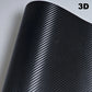 Roll of black carbon fiber vinyl wrap with '3D' text on a white background