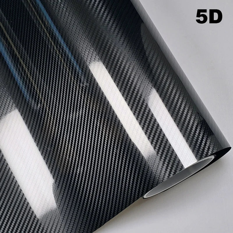 Carbon fiber vinyl wrap roll with '5D' text on a gray background